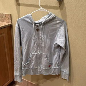 Twisted Heart woman's light blue hooded with a jeweled emblem on the back